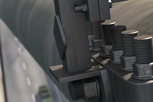 Bolt loosening due to vibration. Stop loosen bolts.